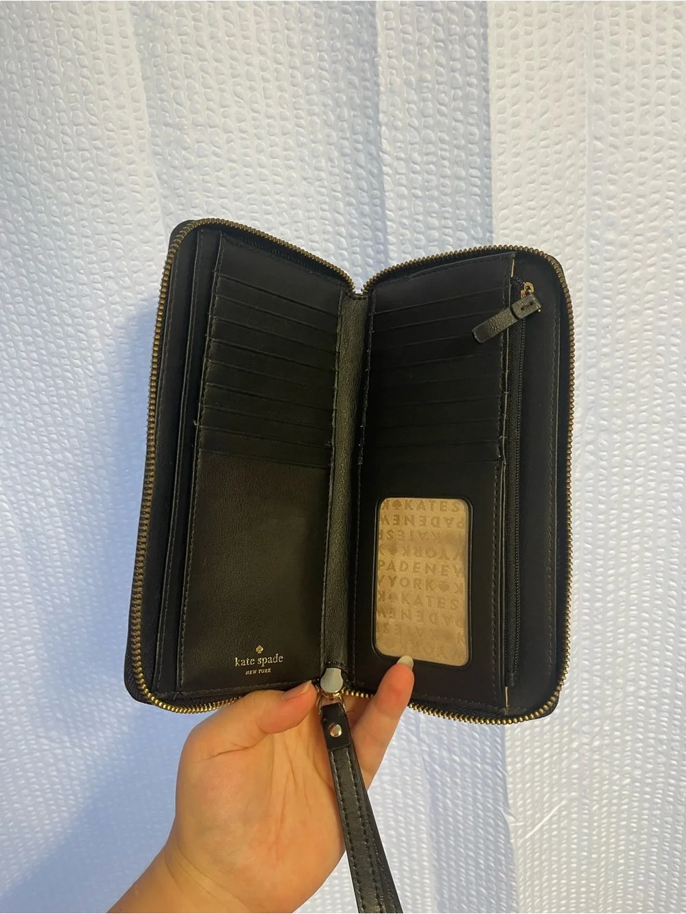 38. Large Kate Spade wallet wristlet.